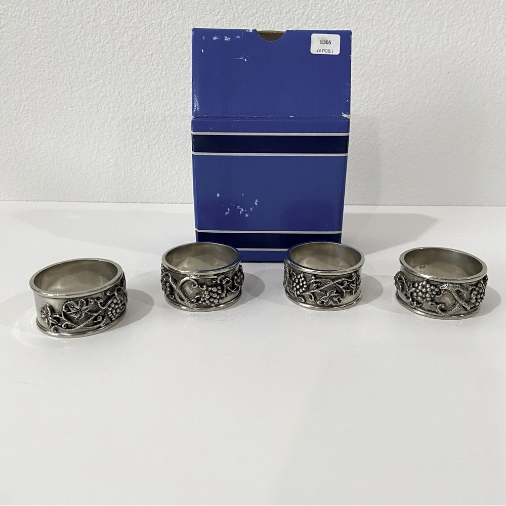 Set of 4 Pewter napkin holders. New with box.